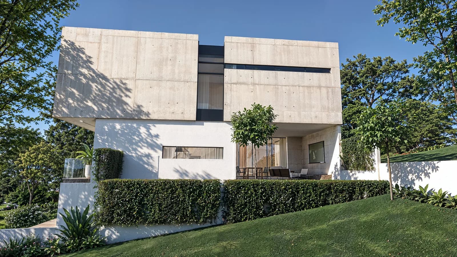 Render de la fachada posterior con volúmenes de concreto y jardín.