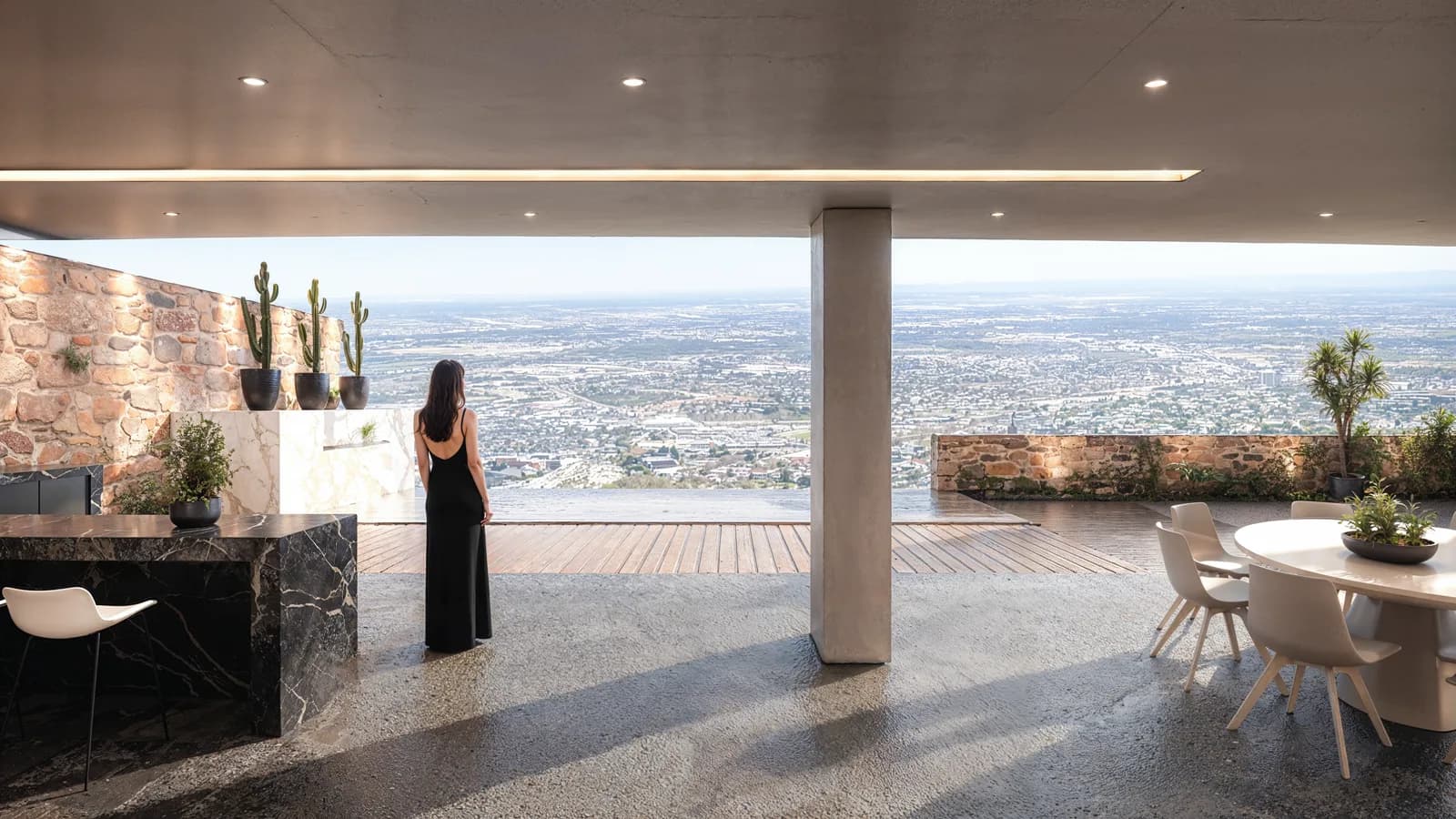 Render de la terraza techada con cocina exterior y vista a la ciudad.