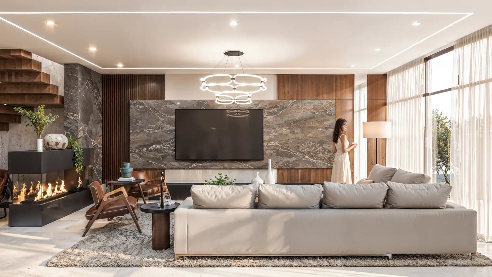 Render de la sala frente al muro de mármol, con pantalla y chimenea lineal.
